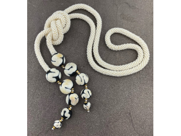 Ivory and black lariat